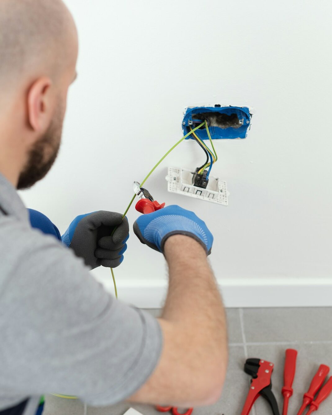 Professional electrician working on the electrical system